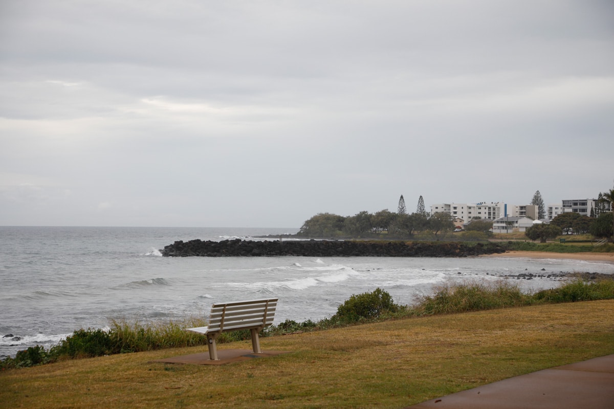 Overcast, windy, rainy, mixed conditions, Beach Report