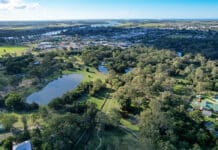 Draft Corporate Plan consultation front cover aerial of Washpool Creek naturalisation project and surrounding suburb